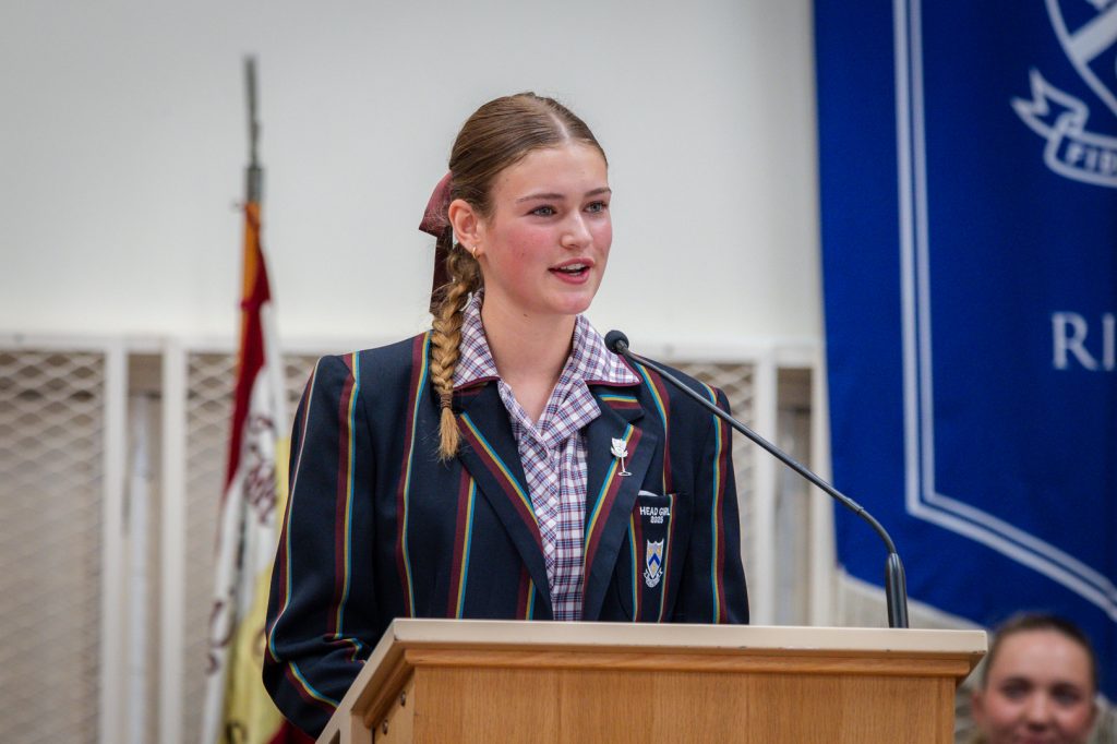 2025 Head Girl Sara Kerr speaking at the Investiture Assembly in January